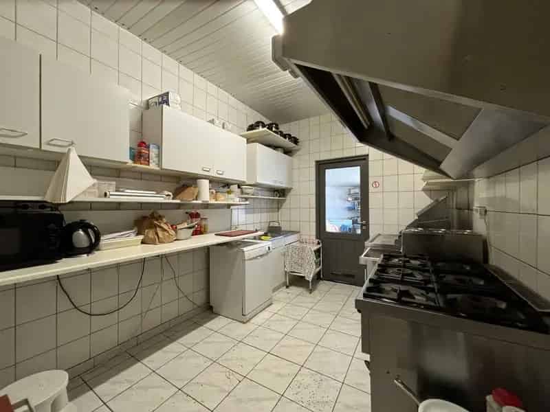 Handelspand met Appartement te Koop nabij Centrum Mol