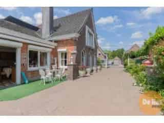 Huis te koop Lede - Charmante woning met dubbele garage en tuin