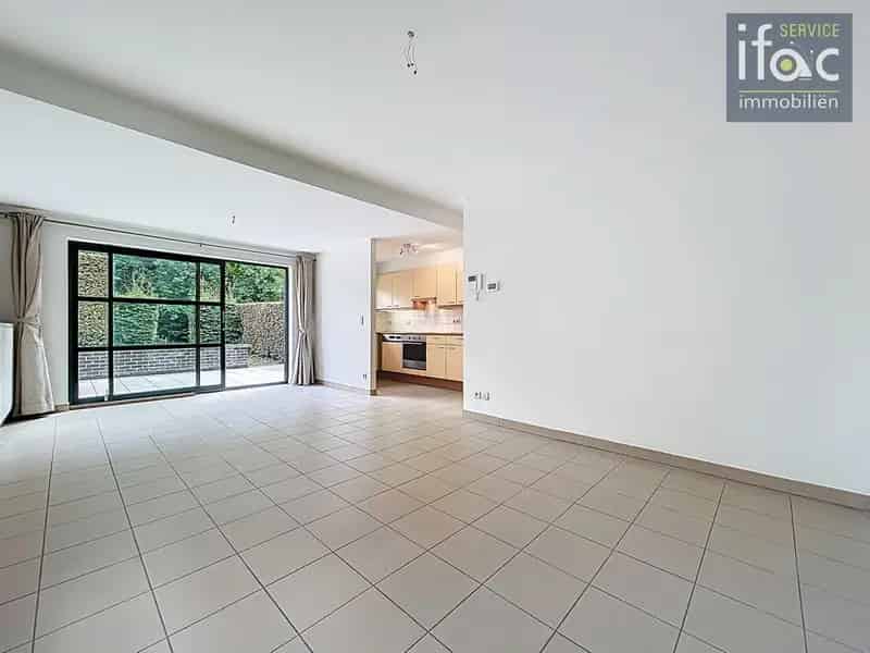 Appartement te koop: gelijkvloers met terras tuin en garage