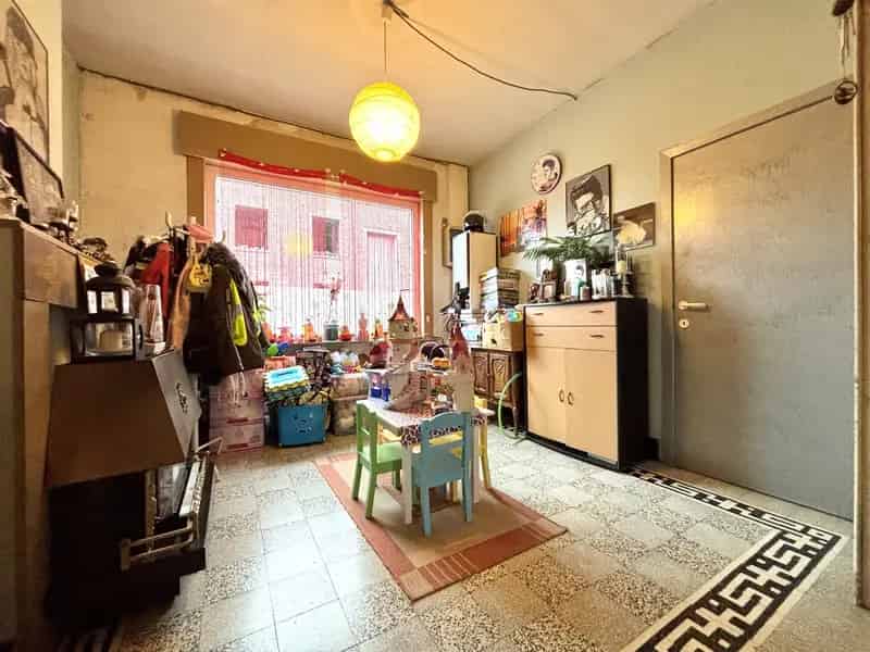 Huis te Huur Heule: Op te frissen Rijwoning met Tuin