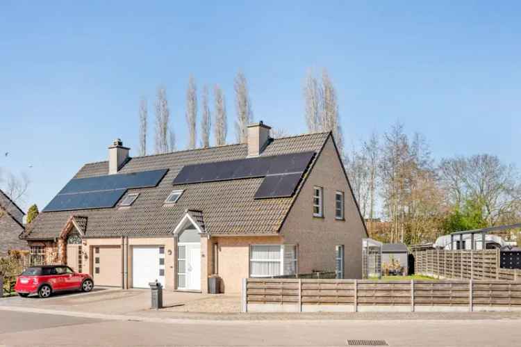 HOB UIT 2003 IN RUSTIGE WOONWIJK MET 3 SLPKS TUIN EN GARAGE