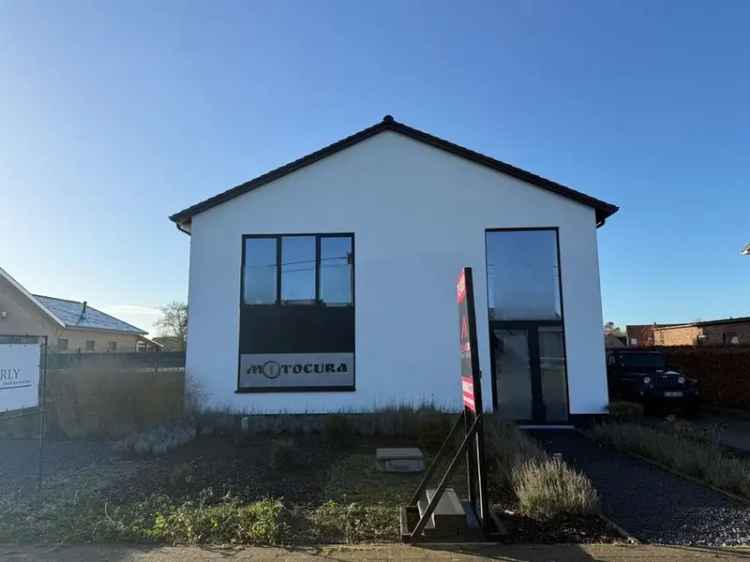 Vrijstaande woning met multifunctionele garage (hobby/handel/praktijkruimte)