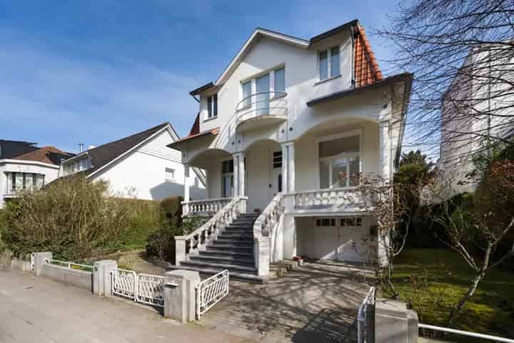 Gezinswoning 4 slaapkamers  tuin garage  renovatie 1990 2005