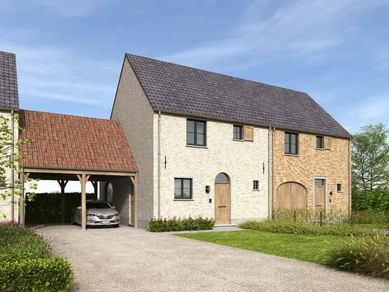 Halfopen Pastorijwoning te Waasmunster