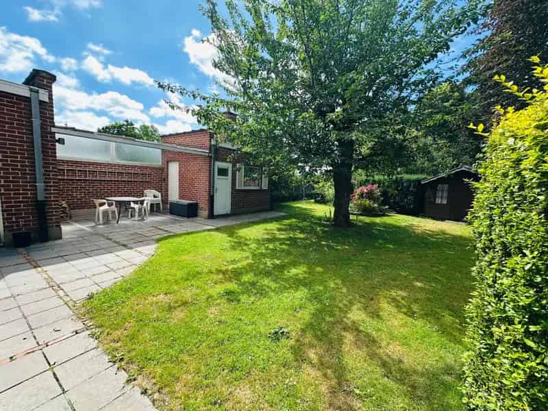 Huis te koop: 4 slaapkamers, 2 garages, Zuidtuin
