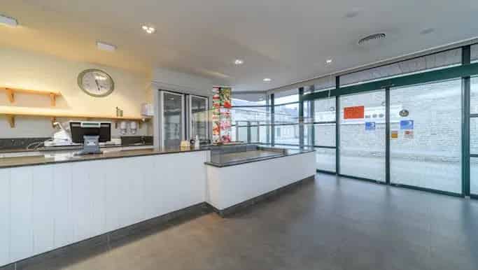 Handelspand met Woning te Koop in Woumen