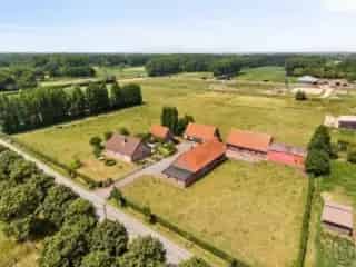 Fermette te koop Hansbeke - Vierkantshoeve met bijgebouwen