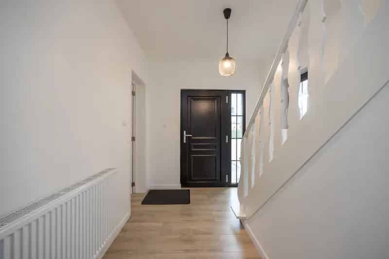 Ruime gezinswoning met garage en tuin te Beerse