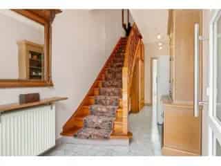 Huis te koop Wommelgem - Instapklare woning met garage en tuin