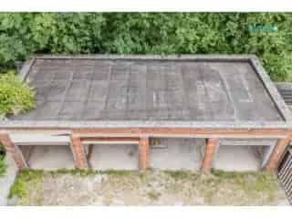 Magazijn met Garages en Bouwgrond te Koop Jumet
