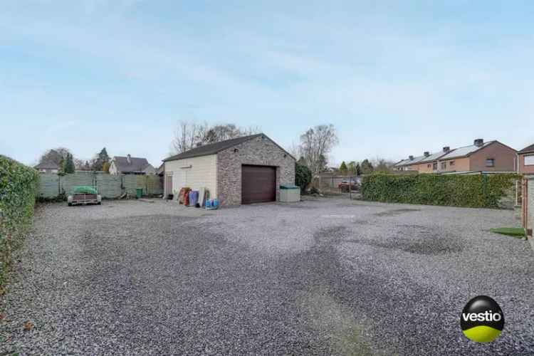 Ruime woning 4 slaapkamers te Opoeteren met grote garage