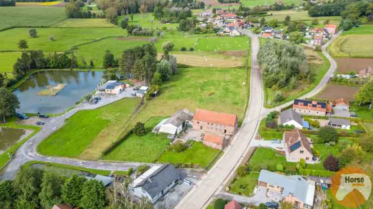 GLABBEEK - Hoeve met bouwgrond en weiland op 87a