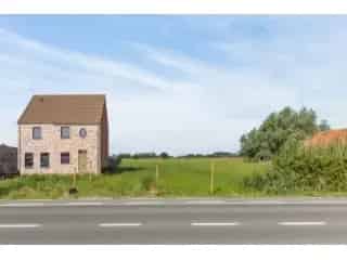 Bouwgrond Wichelen 785m² Halfopen Bebouwing Zuid-West