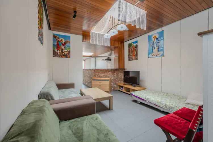 Opbrengsteigendom, Bestaande Uit Een Gelijkvloerse Studio En Een Duplex-Appartement.