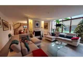 Appartement te huur Ukkel - Ruim appartement met tuin en garage