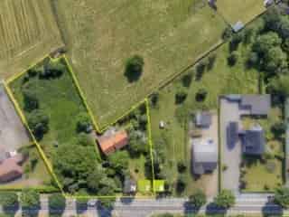 Fermette te koop Maaseik - Te renoveren boerderij met 2 bouwgronden