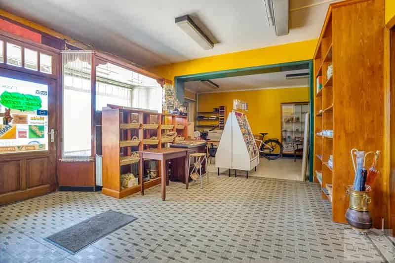 Huis te koop Gruitrode Centrum: Ruime Woning met Handelsruimte