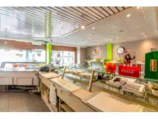 Kantoor te Koop Halle Centrum - Handelsruimte met Keuken en Atelier