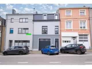 Huis te Koop Arlon - Gerenoveerde woning met garage en tuin