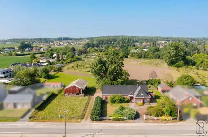 Bouwgrond 3045m2 te huur met woning en loods