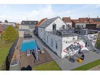 Huis te koop Asse - Ruime woning met loods showroom en appartement