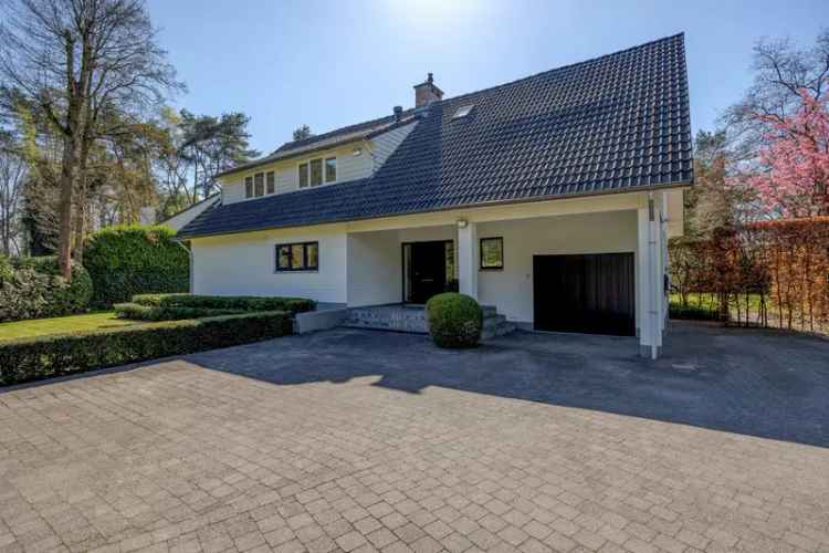 Koningshof Villa te Schoten: Instapklaar met 4 slaapkamers en Zuidwest tuin