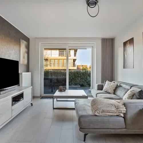 Instapklaar gelijkvloersappartement De Panne met tuin en terras