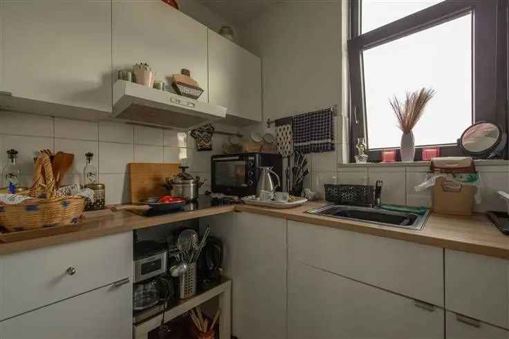 Penthouse te koop met groot terras en garage in België