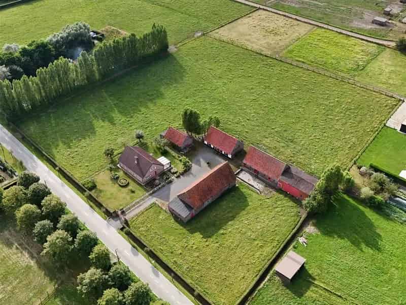 Huis te koop: Te renoveren hoeve met bijgebouwen nabij Hansbeke