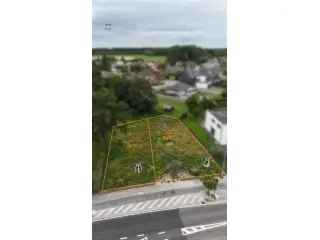 Bouwgrond Lippelo 390m² - Halfopen Bebouwing - Rustige Ligging