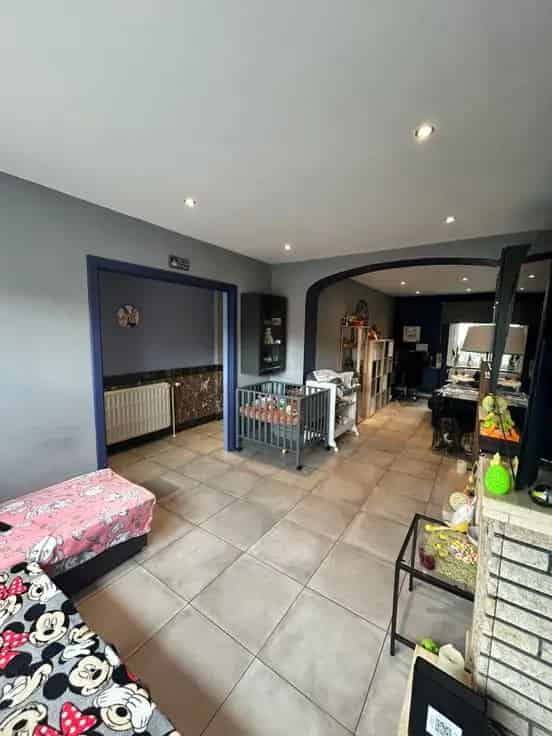 Huis Te Koop met Garage en Tuin Nabij Alle Faciliteiten