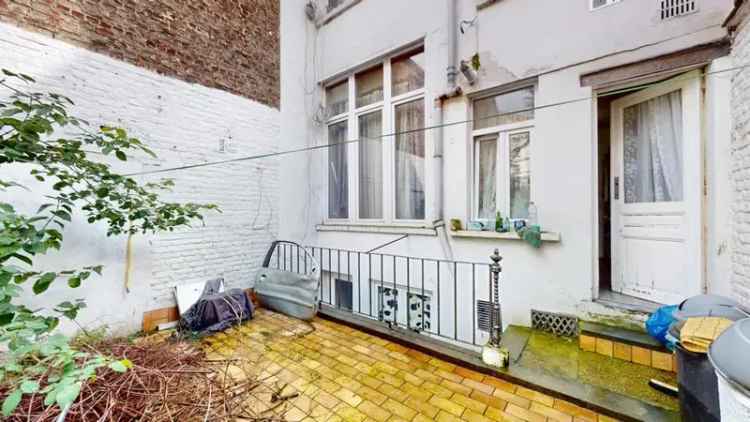 Te koop appartement te Schaerbeek met tuin en potentie voor souplex