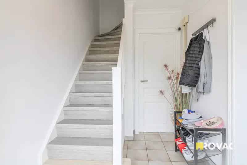 Rijwoning met tuin en garage
