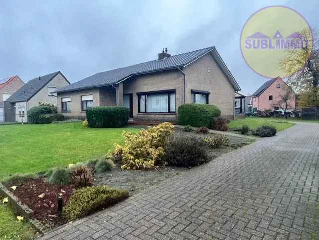 Gelijkvloerse woning 1185m² perceel