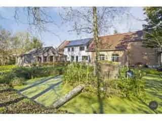Fermette te koop Hever - gerenoveerde hoeve met sauna en schuur