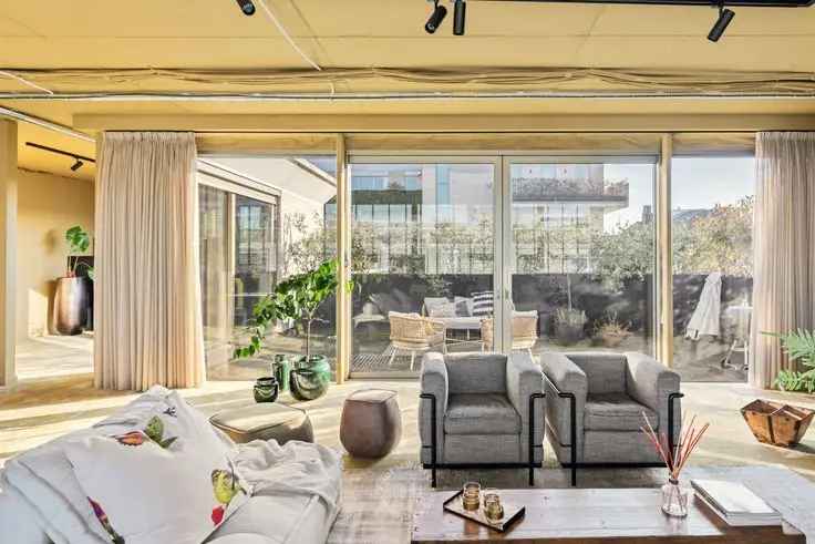 Penthouse te koop op de Kouter met uniek terras en moderne architectuur