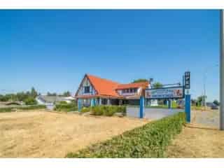 Handelspand te Koop Maaseik  Wonen en Werken