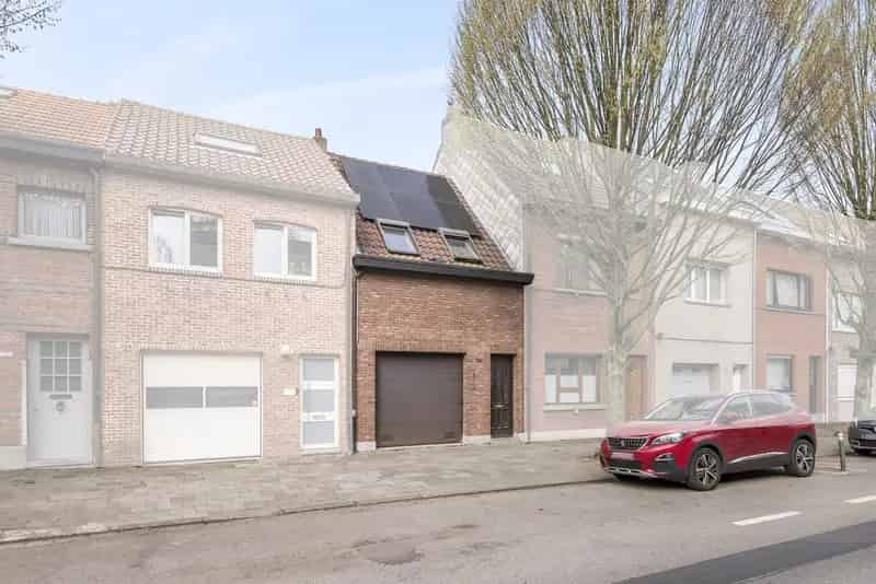 Huis te koop Wilrijk: Knusse woning met tuin garage en zonnepanelen