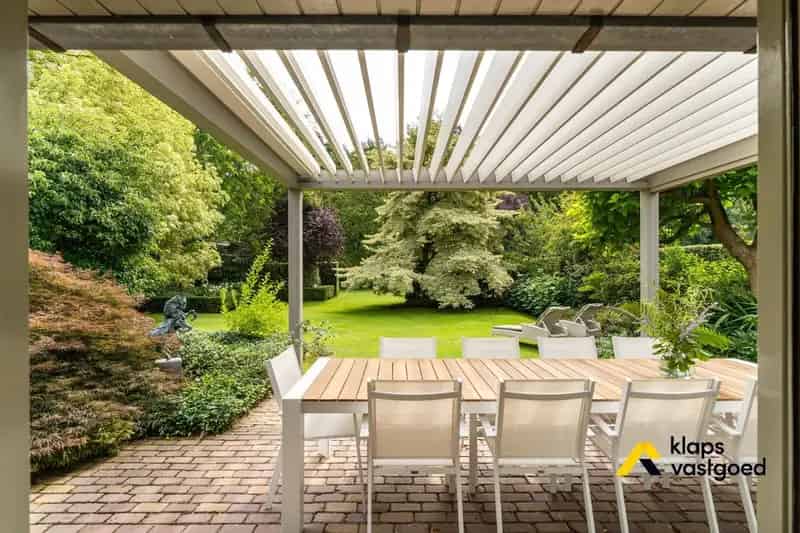 WONING MET PRAKTIJKRUIMTE EN PARKTUIN OP 21 ARE