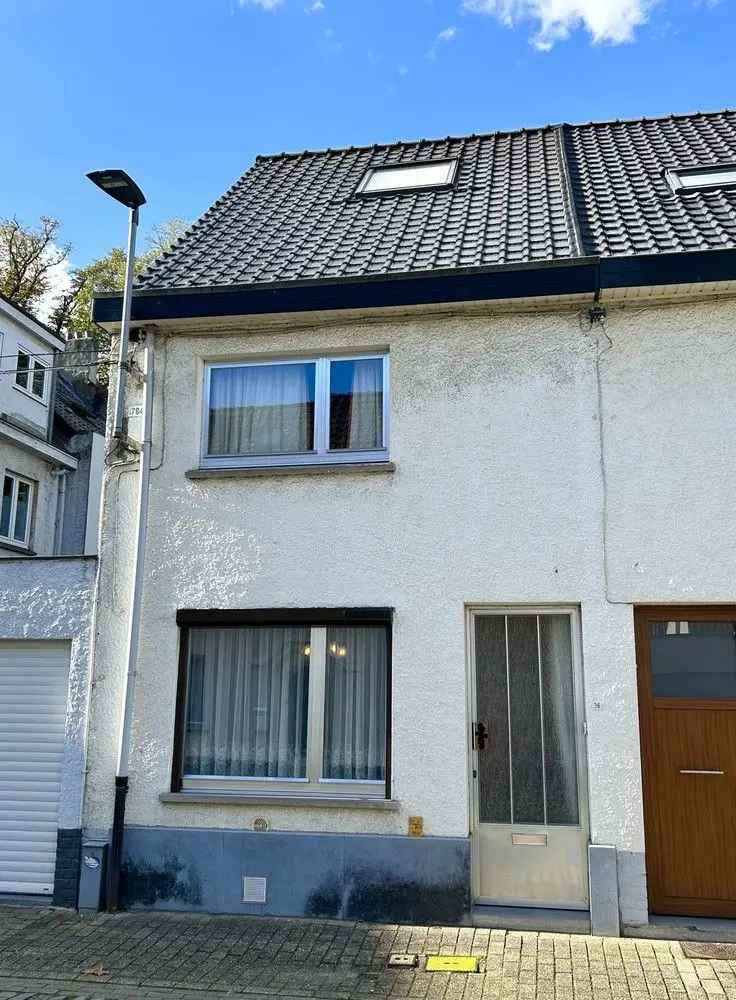 Te renoveren huis in Leuven met garage en binnenkoer