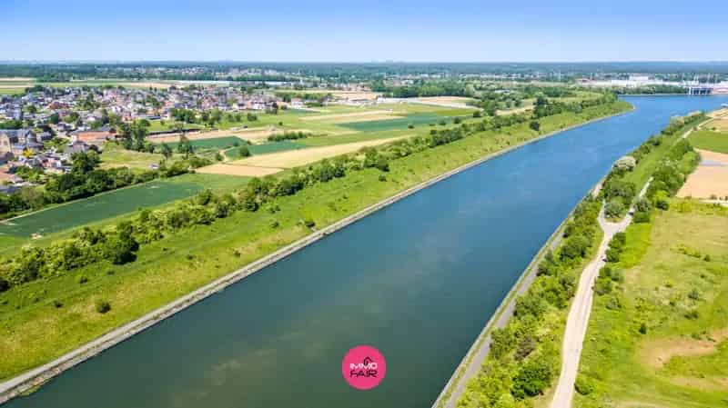 Bouwgrond Veldwezelt nabij Maastricht: 668m² + 6012m² Weiland