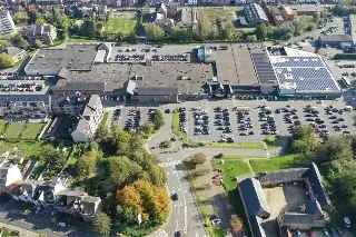 Handelspand te huur Ottignies 120m² Winkelcentrum Le Douaire