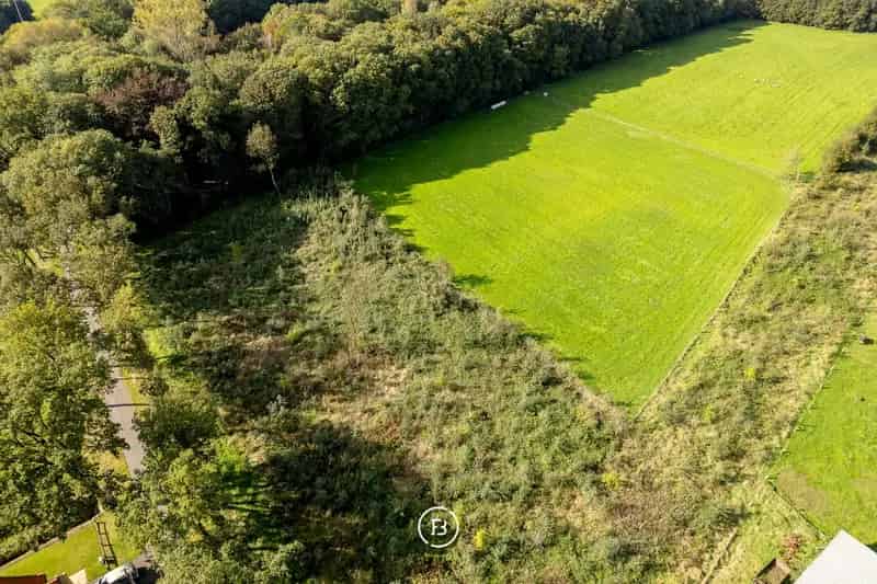 Bouwgrond te koop: 2 percelen met landelijk zicht nabij E40