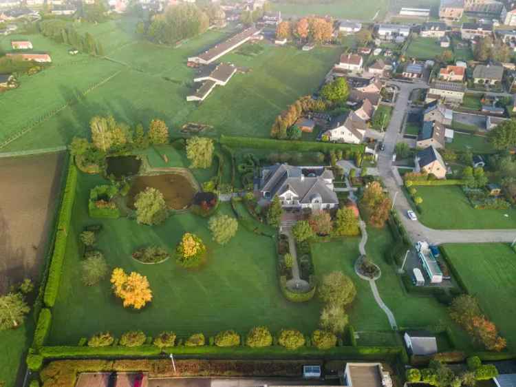 Uniek landhuis of verkaveling van 11 bouwgronden