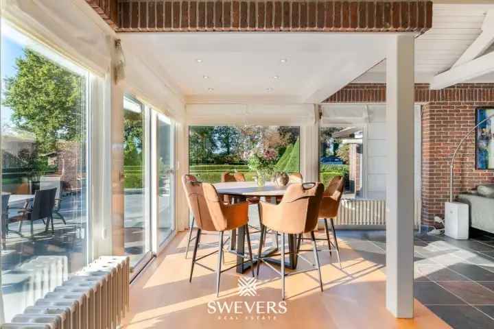 Te koop huis in Geetbets met uitzonderlijke architectuur en groene omgeving