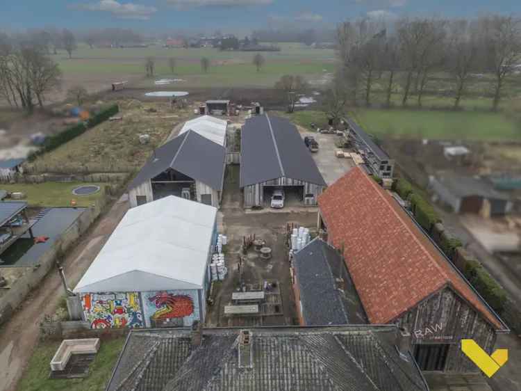 Verkoop multifunctioneel gebouw te Vorst-Meerlaar met hallen en grond