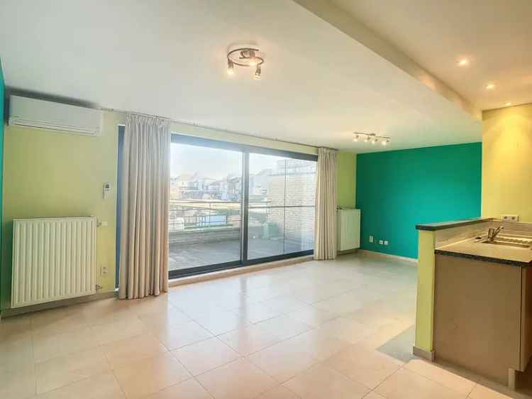 Gezellig appartement Tienen: 2 slaapkamers, ruim terras en airco