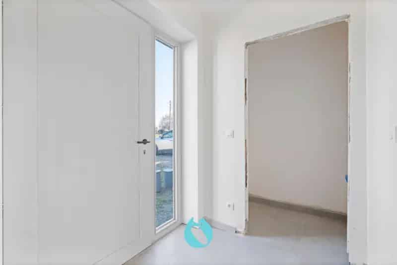 Huis te Koop Sleidinge: Halfopen Bebouwing Nabij Centrum