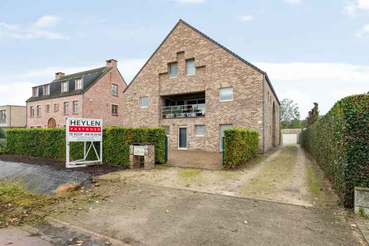 Prachtig gelijkvloers appartement met 2 slaapkamers, tuin en garage