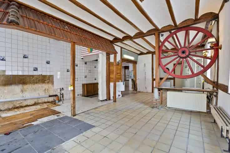 Huis Te Koop Kessel-Lo: Halfopen Hoekwoning met Garage en Potentieel